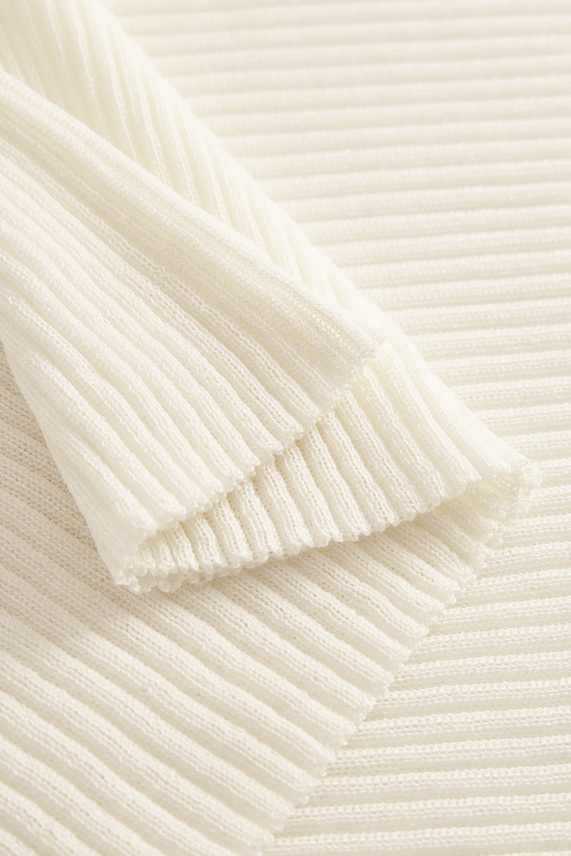 MKDT Studio Kossy Tech Light Knit Sweater IVORY